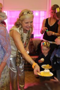OCBG Chair, Jackie Holderness, spreading cupcakes and sparkle
